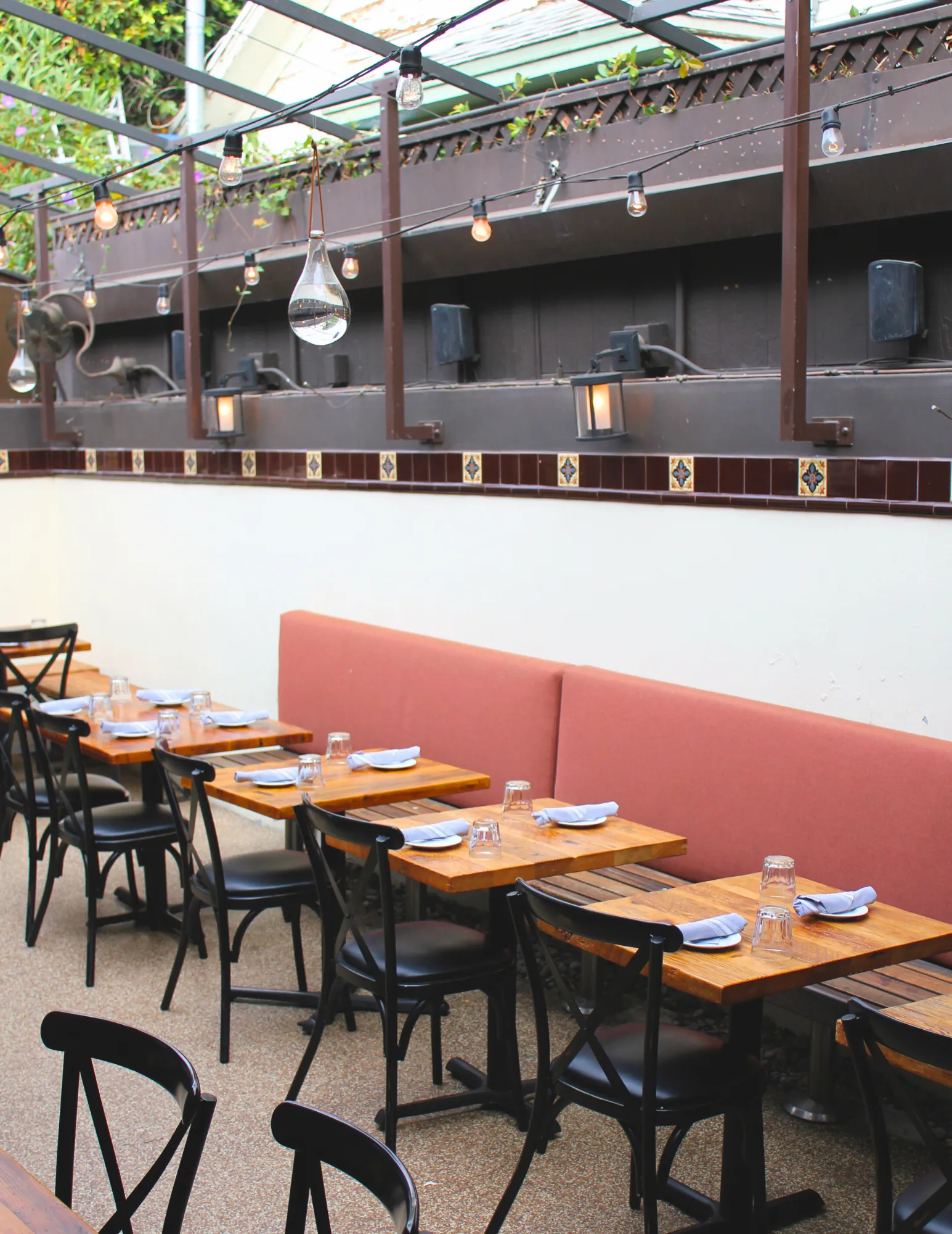 Back patio tables set for the evening