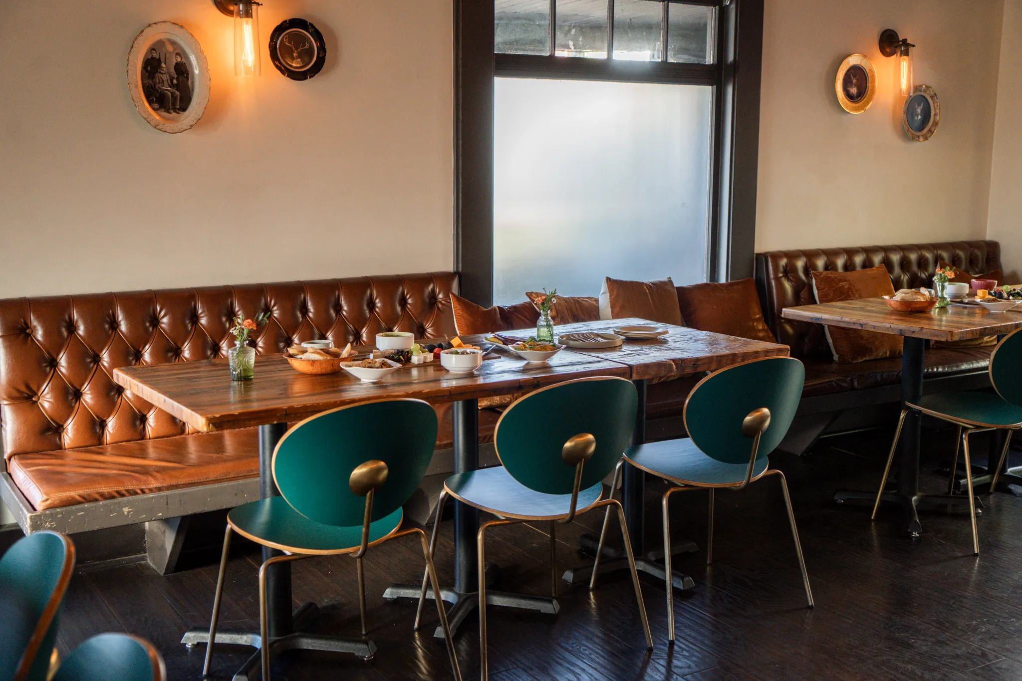 Dining room tables arranged for a group meal